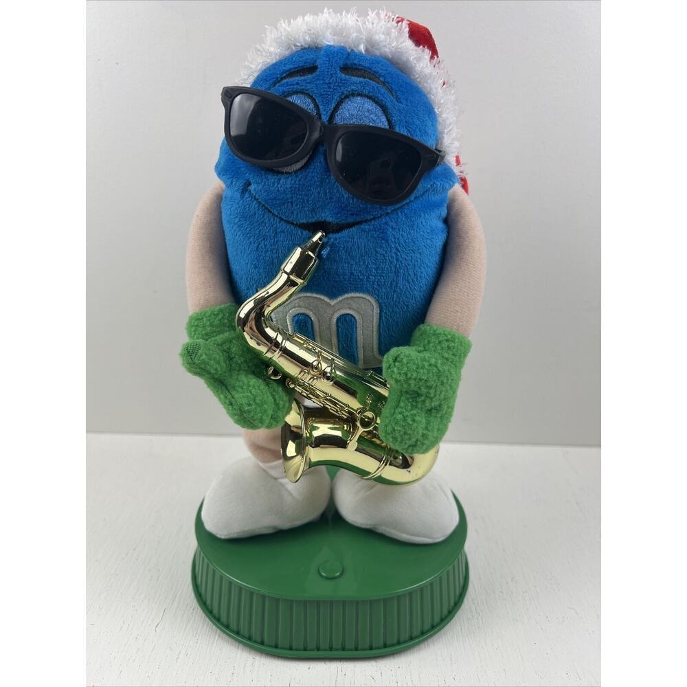 Blue M & M MUSICAL Animation Rock Around the Christmas Tree Santa Hat Sax‎ Works